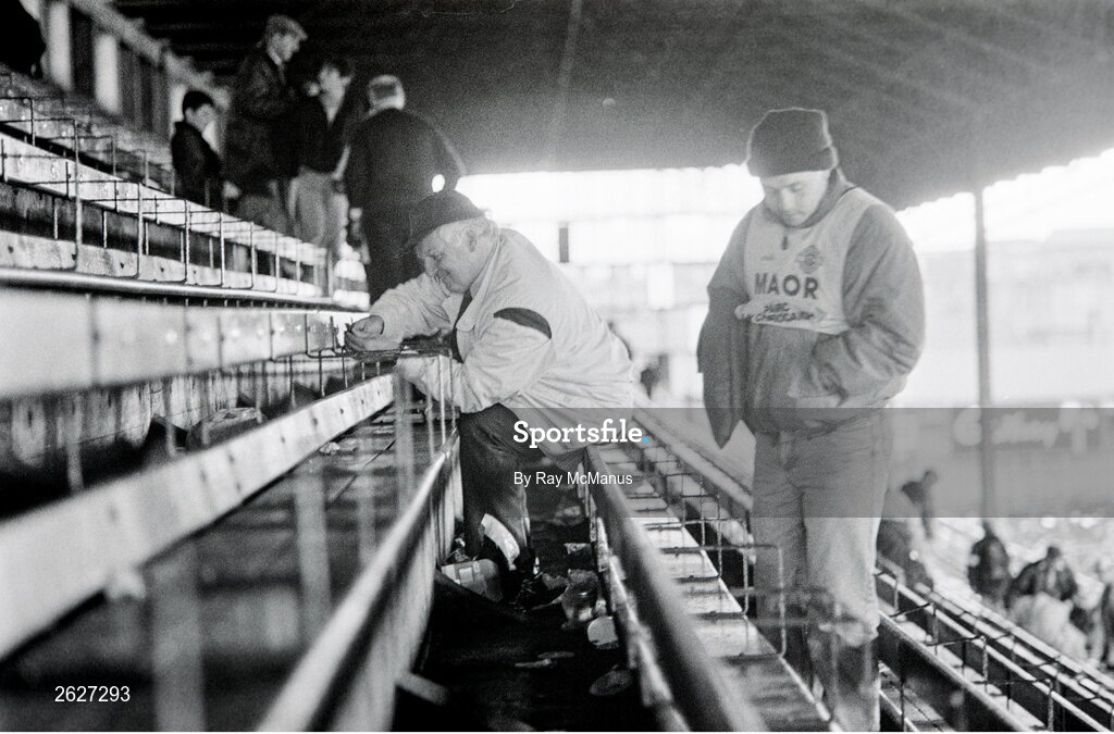 19 September 1993; A supporter takes a momento from the Cusack stand after it's last match before demolition to make way for a new Cusack stand, as part of phase one of the redevelopment of the stadium, after the All-Ireland Senior Football Championship Final match between Derry and Cork at Croke Park in Dublin. Photo by Ray McManus/Sportsfile