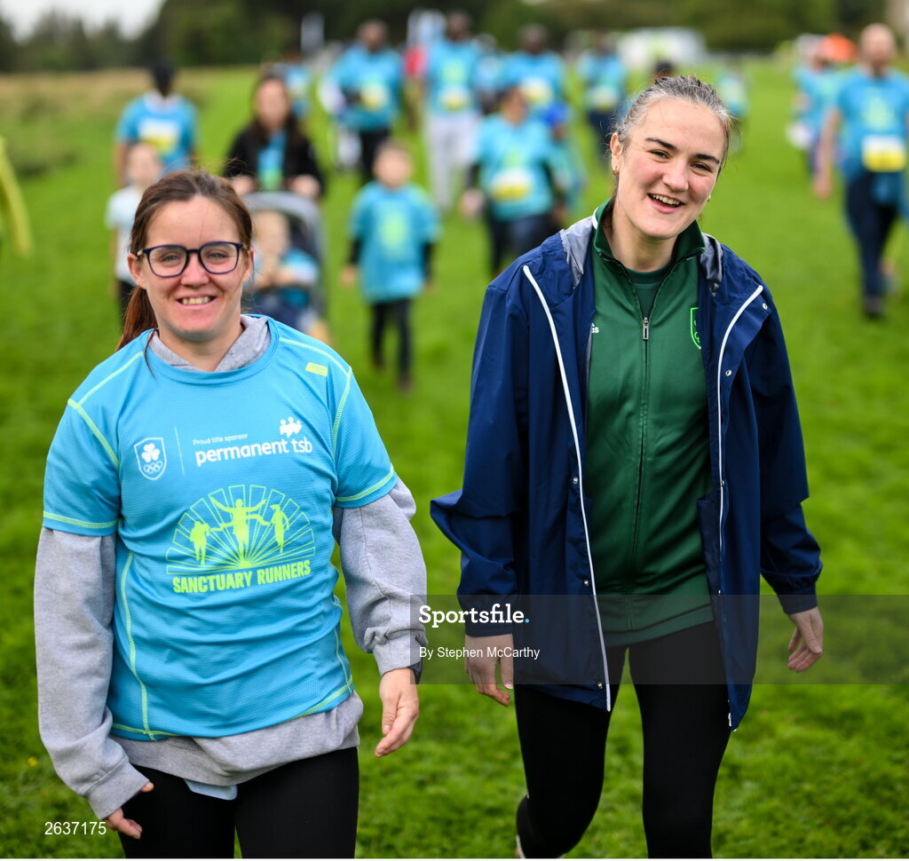1 October 2023; Olympic gold medallist Kellie Harrington walks with Vicky Rooney, from Cabra, during the Permanent TSB Sanctuary Run 2023 at the Cross Country track of the Sport Ireland Campus in Dublin. The Permanent TSB Sanctuary Run on the Sport Ireland campus attracted nearly 1,000 participants including refugees from Direct Provision centres across Ireland, Ukrainian people in Dublin, locals and Irish Olympians. The event, to celebrate diversity and interculturalism in Ireland today, was run by the Sanctuary Runners’ organisation and supported by the Olympic Federation of Ireland and Athletics Ireland. Photo by Stephen McCarthy/Sportsfile