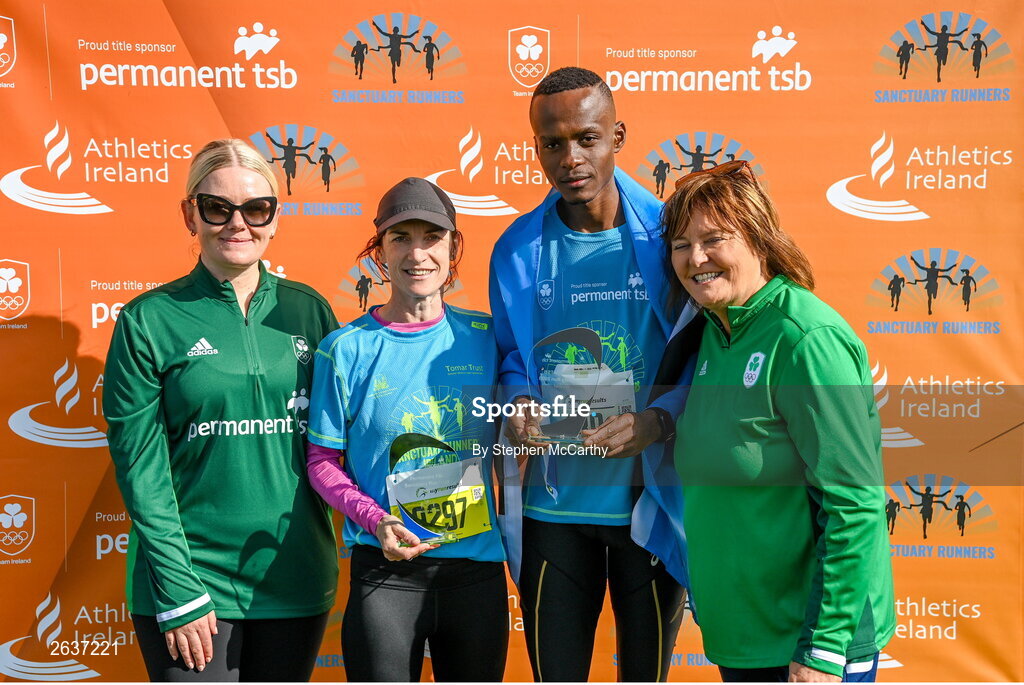 1 October 2023; Courtnee Kyle, sustainability and sponsorships manager at Permanent TSB, left, and Catherine Tiernan, Olympic Federation of Ireland commercial director, with race winners Sorcha Loughnane and Kahumburuka Ivan Tuahuku during the Permanent TSB Sanctuary Run 2023 at the Cross Country track of the Sport Ireland Campus in Dublin. The Permanent TSB Sanctuary Run on the Sport Ireland campus attracted nearly 1,000 participants including refugees from Direct Provision centres across Ireland, Ukrainian people in Dublin, locals and Irish Olympians. The event, to celebrate diversity and interculturalism in Ireland today, was run by the Sanctuary Runners’ organisation and supported by the Olympic Federation of Ireland and Athletics Ireland. Photo by Stephen McCarthy/Sportsfile