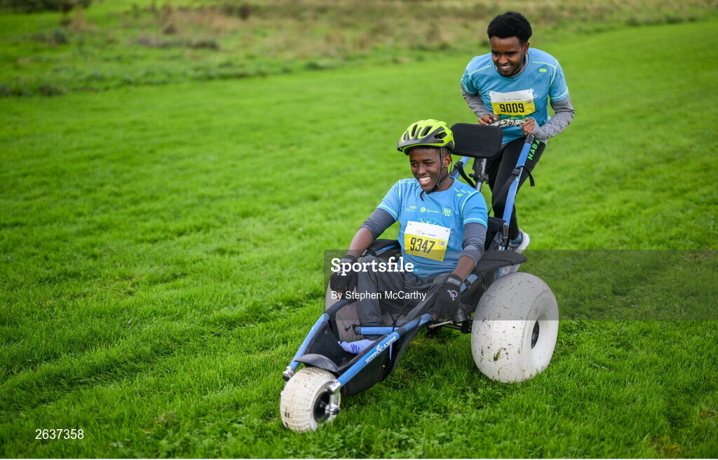 1 October 2023; Liibaan Ahmed Mohammed is pushed by Ismail Yusuf Abuukar during the Permanent TSB Sanctuary Run 2023 at the Cross Country track of the Sport Ireland Campus in Dublin. The Permanent TSB Sanctuary Run on the Sport Ireland campus attracted nearly 1,000 participants including refugees from Direct Provision centres across Ireland, Ukrainian people in Dublin, locals and Irish Olympians. The event, to celebrate diversity and interculturalism in Ireland today, was run by the Sanctuary Runners’ organisation and supported by the Olympic Federation of Ireland and Athletics Ireland. Photo by Stephen McCarthy/Sportsfile
