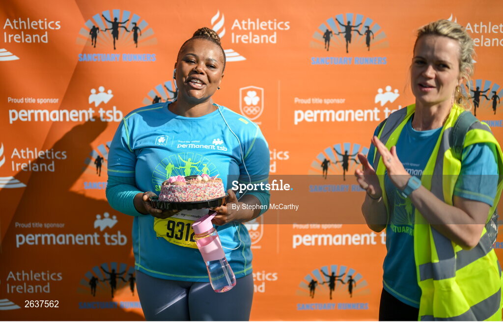 1 October 2023; Zikona Masala is presented with a birthday cake by Ailis McSweeney of The Sanctuary Runners during the Permanent TSB Sanctuary Run 2023 at the Cross Country track of the Sport Ireland Campus in Dublin. The Permanent TSB Sanctuary Run on the Sport Ireland campus attracted nearly 1,000 participants including refugees from Direct Provision centres across Ireland, Ukrainian people in Dublin, locals and Irish Olympians. The event, to celebrate diversity and interculturalism in Ireland today, was run by the Sanctuary Runners’ organisation and supported by the Olympic Federation of Ireland and Athletics Ireland. Photo by Stephen McCarthy/Sportsfile