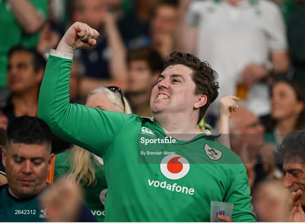 7 October 2023; An Ireland supporter celebrates a try during the 2023 Rugby World Cup Pool B match between Ireland and Scotland at the Stade de France in Paris, France. Photo by Brendan Moran/Sportsfile Photo by Brendan Moran/Sportsfile
