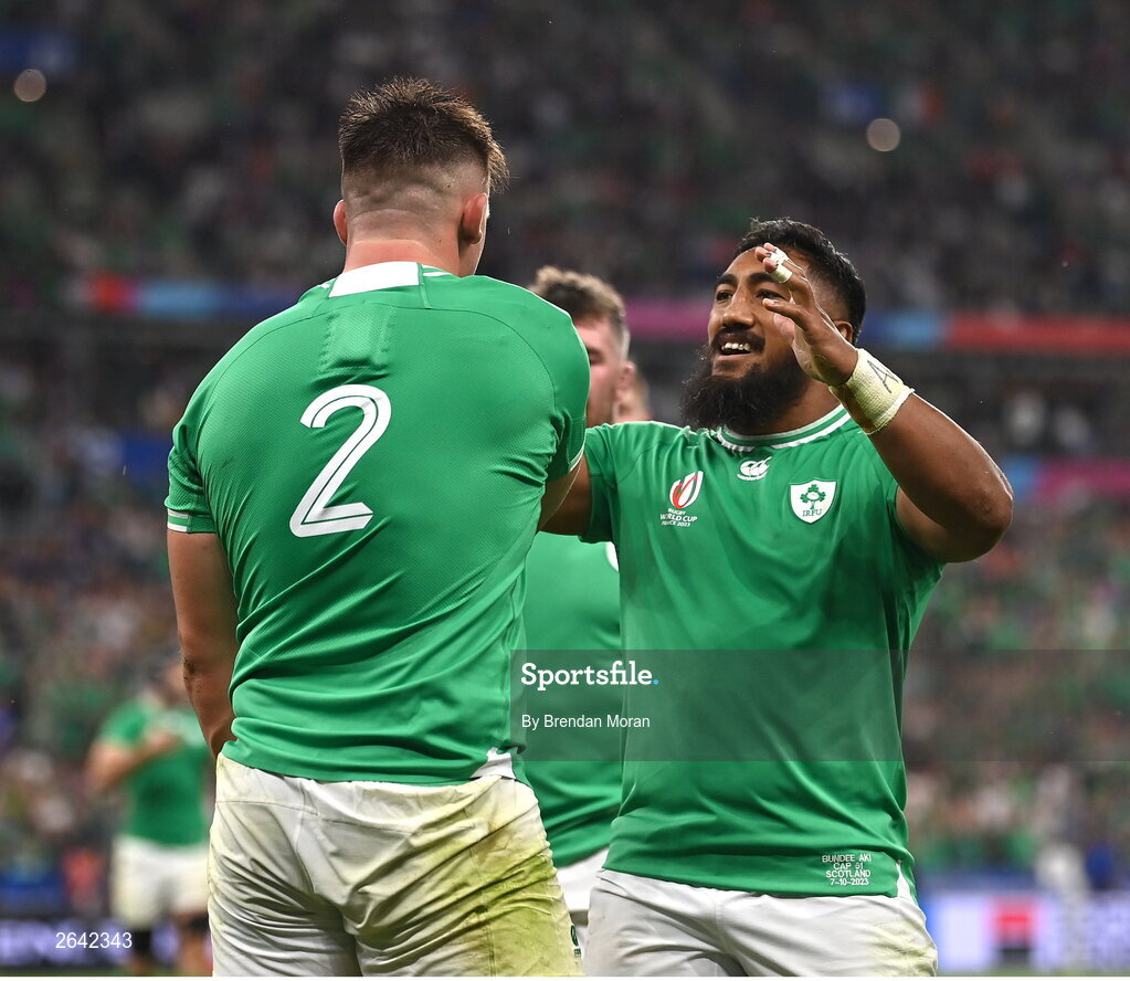 7 October 2023; Dan Sheehan of Ireland, 2, celebrates with teammate Bundee Aki after scoring their side's fifth try, in the 44th minute, during the 2023 Rugby World Cup Pool B match between Ireland and Scotland at the Stade de France in Paris, France. Photo by Brendan Moran/Sportsfile