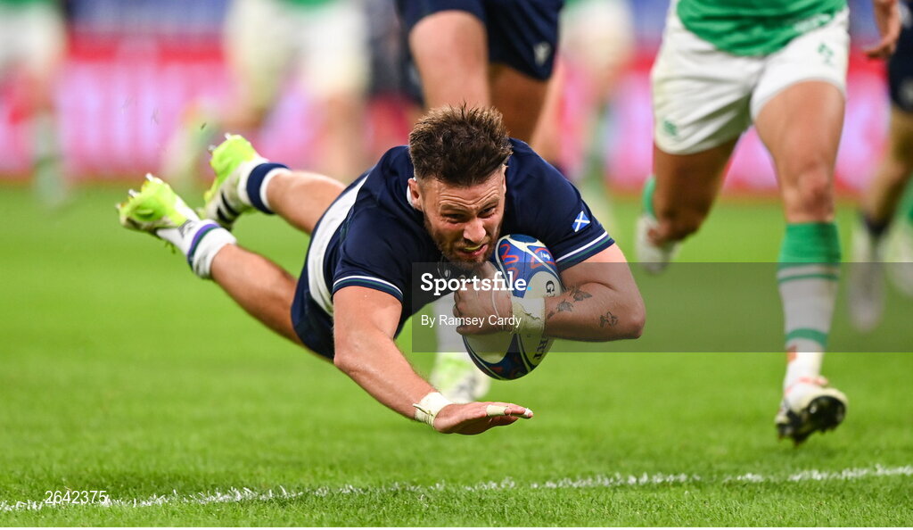 7 October 2023; Ali Price of Scotland dives over to score his side's second try during the 2023 Rugby World Cup Pool B match between Ireland and Scotland at the Stade de France in Paris, France. Photo by Ramsey Cardy/Sportsfile