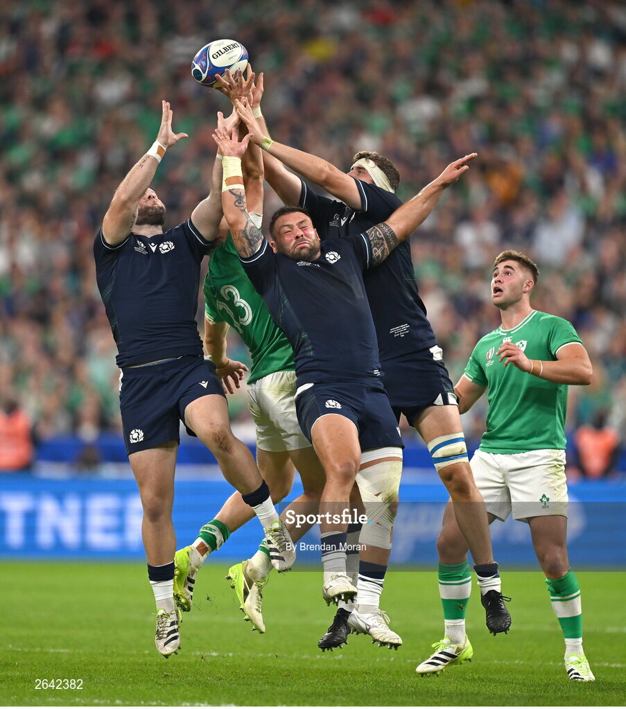 7 October 2023; Garry Ringrose of Ireland contests a high ball against Scotland players Ewan Ashman, Rory Sutherland and Scott Cummings during the 2023 Rugby World Cup Pool B match between Ireland and Scotland at the Stade de France in Paris, France. Photo by Brendan Moran/Sportsfile