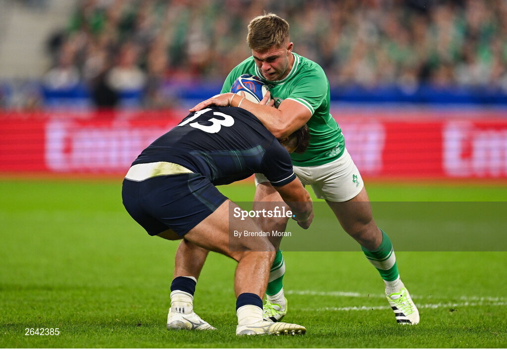7 October 2023; Jack Crowley of Ireland is tackled by Huw Jones of Scotland during the 2023 Rugby World Cup Pool B match between Ireland and Scotland at the Stade de France in Paris, France. Photo by Brendan Moran/Sportsfile