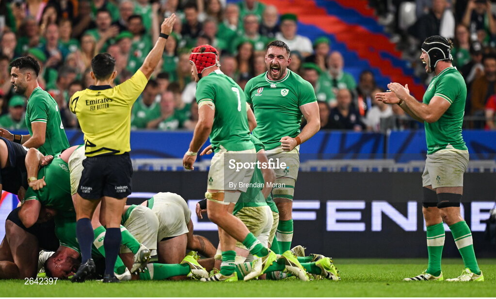 7 October 2023; Ireland players Jack Conan, centre, and Caelan Doris, right, celebrate their side winning a penalty during the 2023 Rugby World Cup Pool B match between Ireland and Scotland at the Stade de France in Paris, France. Photo by Brendan Moran/Sportsfile