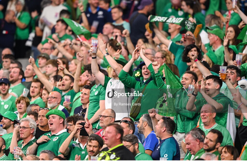 7 October 2023; Ireland supporters celebrate after their side's victory in the 2023 Rugby World Cup Pool B match between Ireland and Scotland at the Stade de France in Paris, France. Photo by Ramsey Cardy/Sportsfile