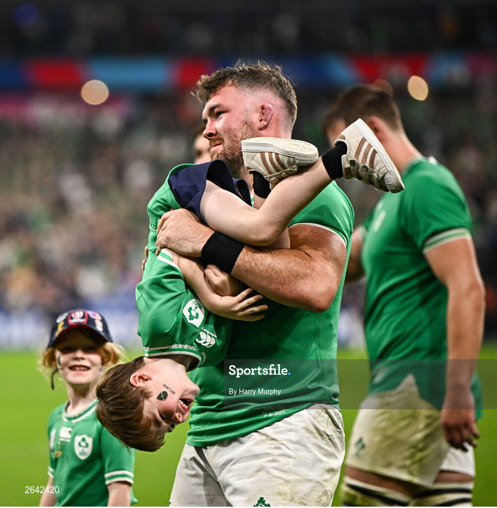 7 October 2023; Peter O’Mahony of Ireland celebrates with his son Theo after their side's victory in the 2023 Rugby World Cup Pool B match between Ireland and Scotland at the Stade de France in Paris, France. Photo by Harry Murphy/Sportsfile
