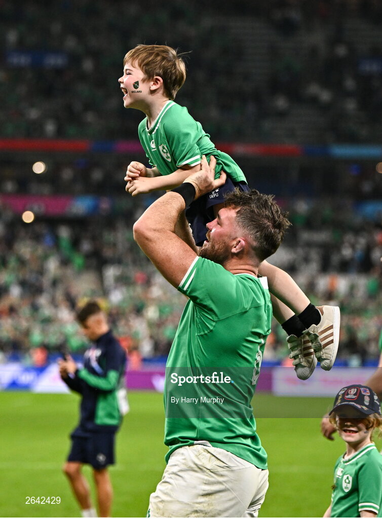 7 October 2023; Peter O’Mahony of Ireland celebrates with his son Theo after their side's victory in the 2023 Rugby World Cup Pool B match between Ireland and Scotland at the Stade de France in Paris, France. Photo by Harry Murphy/Sportsfile