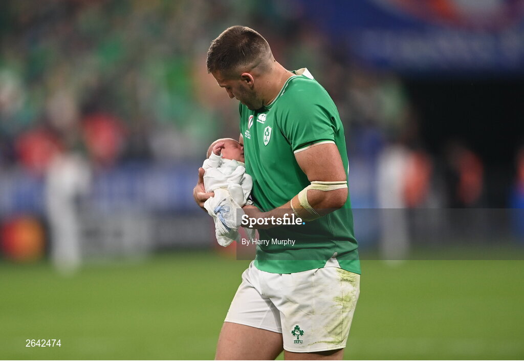 7 October 2023; Stuart McCloskey of Ireland with his newborn son Kasper after his side's victory in the 2023 Rugby World Cup Pool B match between Ireland and Scotland at the Stade de France in Paris, France. Photo by Harry Murphy/Sportsfile