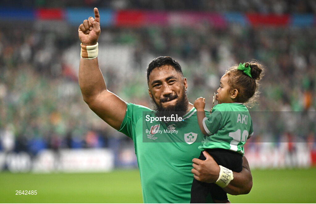 7 October 2023; Bundee Aki of Ireland celebrates with his daughter Ailbhe Ali'itasithe after his side's victory in 2023 Rugby World Cup Pool B match between Ireland and Scotland at the Stade de France in Paris, France. Photo by Harry Murphy/Sportsfile