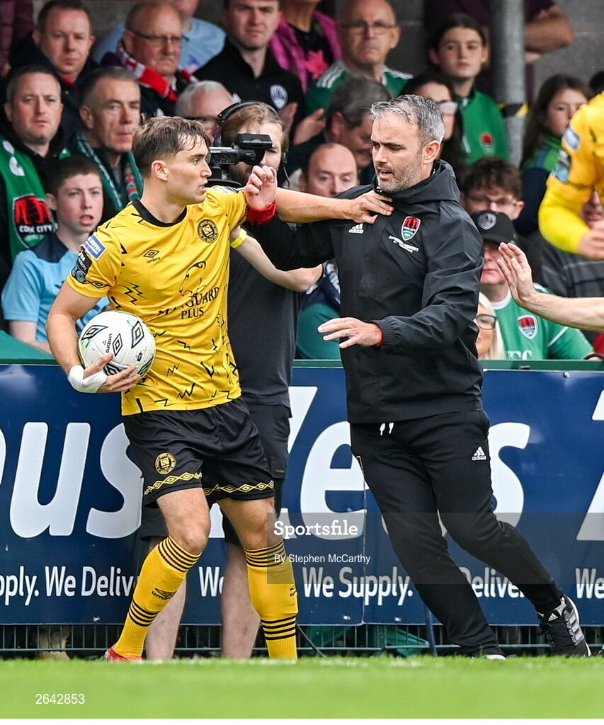 8 October 2023; Anto Breslin of St Patrick's Athletic and Cork City manager Richie Holland tussle over possession of the ball during the Sports Direct Men’s FAI Cup semi-final match between Cork City and St Patrick's Athletic at Turner’s Cross in Cork. Photo by Stephen McCarthy/Sportsfile