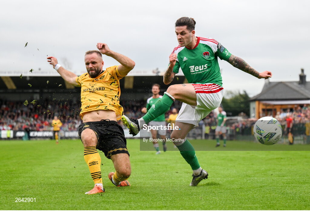 8 October 2023; Ruairi Keating of Cork City has his shot blocked by Ryan McLoughlin of St Patrick's Athletic during the Sports Direct Men’s FAI Cup semi-final match between Cork City and St Patrick's Athletic at Turner’s Cross in Cork. Photo by Stephen McCarthy/Sportsfile