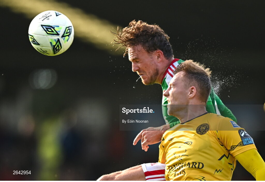 8 October 2023; Ben Worman of Cork City in action against Jamie Lennon of St Patrick's Athletic during the Sports Direct Men’s FAI Cup semi-final match between Cork City and St Patrick's Athletic at Turner’s Cross in Cork. Photo by Eóin Noonan/Sportsfile