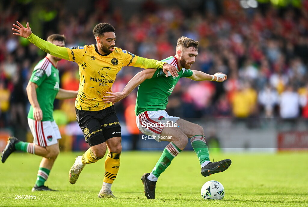8 October 2023; Conor Drinan of Cork City in action against Jake Mulraney of St Patrick's Athletic during the Sports Direct Men’s FAI Cup semi-final match between Cork City and St Patrick's Athletic at Turner’s Cross in Cork. Photo by Eóin Noonan/Sportsfile