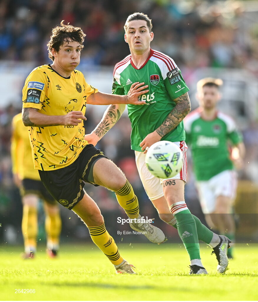 8 October 2023; Ruairi Keating of Cork City in action against David Norman of St Patrick's Athletic during the Sports Direct Men’s FAI Cup semi-final match between Cork City and St Patrick's Athletic at Turner’s Cross in Cork. Photo by Eóin Noonan/Sportsfile