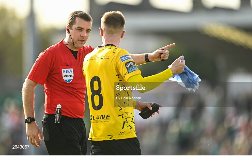 8 October 2023; Chris Forrester of St Patrick's Athletic with referee Rob Harvey during the Sports Direct Men’s FAI Cup semi-final match between Cork City and St Patrick's Athletic at Turner’s Cross in Cork. Photo by Eóin Noonan/Sportsfile