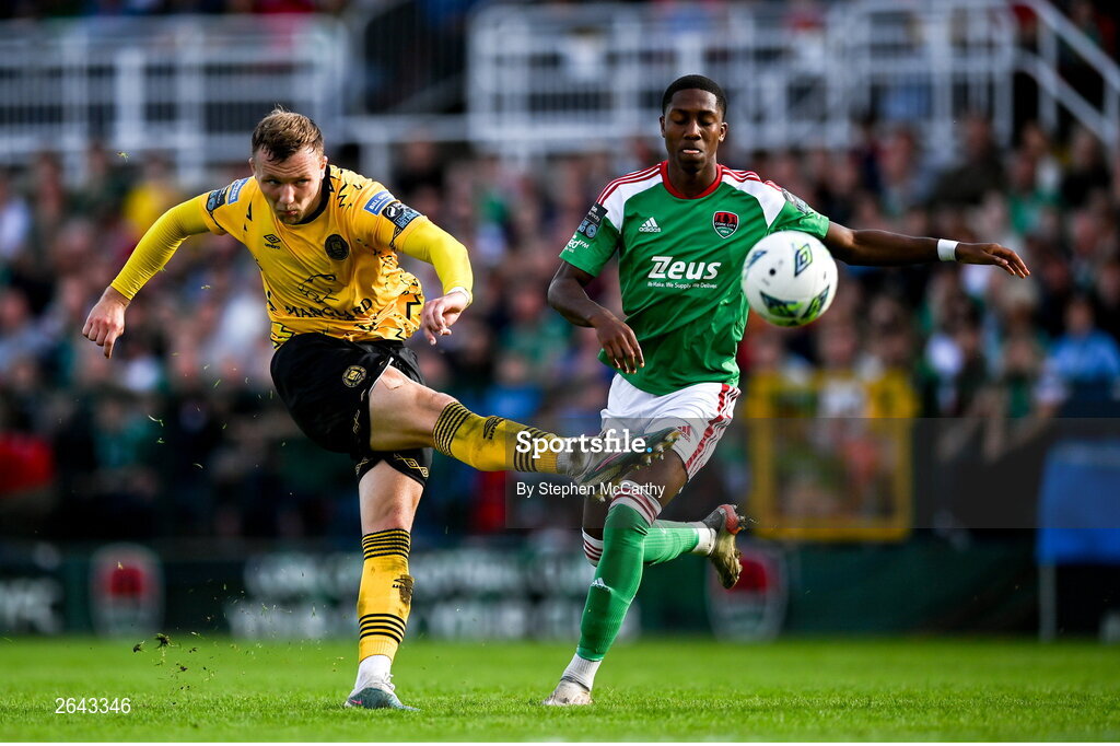 8 October 2023; Jamie Lennon of St Patrick's Athletic has a shot on goal despite the attention of Malik Dijksteel of Cork City during the Sports Direct Men’s FAI Cup semi-final match between Cork City and St Patrick's Athletic at Turner’s Cross in Cork. Photo by Stephen McCarthy/Sportsfile