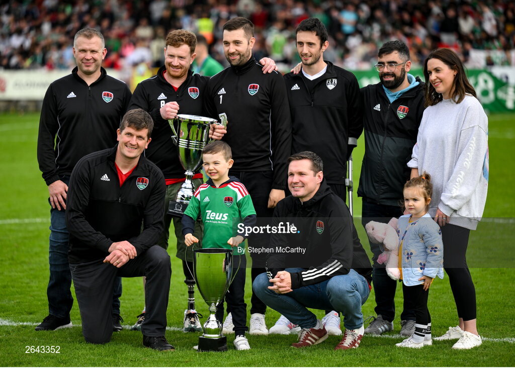 8 October 2023; Cork City amputee team with the Permanent TSB National League title and the David Saunders memorial cup pose for a photograph on the pitch at half-time of the Sports Direct Men’s FAI Cup semi-final match between Cork City and St Patrick's Athletic at Turner’s Cross in Cork. Photo by Stephen McCarthy/Sportsfile