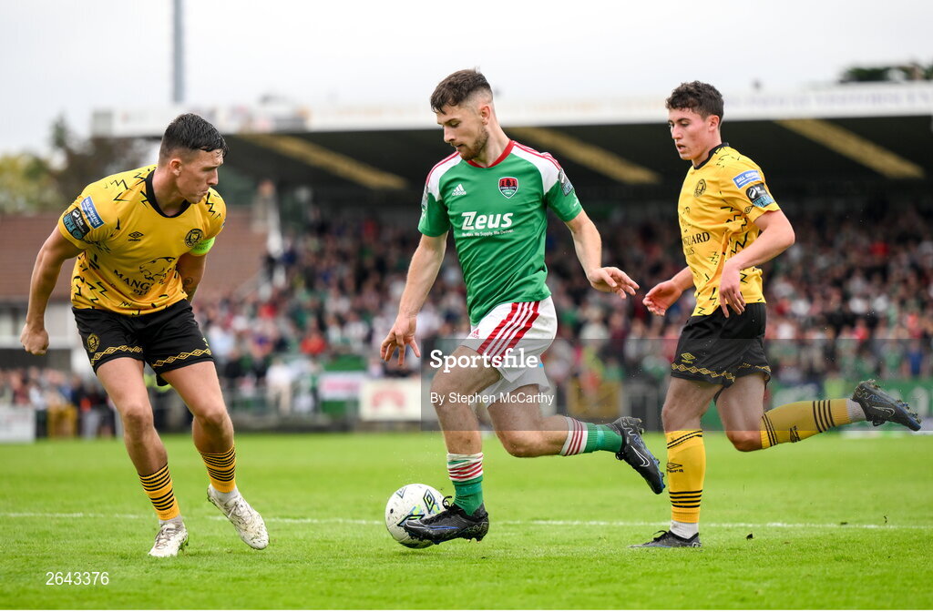 8 October 2023; Aaron Bolger of Cork City in action against Joe Redmond, left, and Kian Leavy of St Patrick's Athletic during the Sports Direct Men’s FAI Cup semi-final match between Cork City and St Patrick's Athletic at Turner’s Cross in Cork. Photo by Stephen McCarthy/Sportsfile