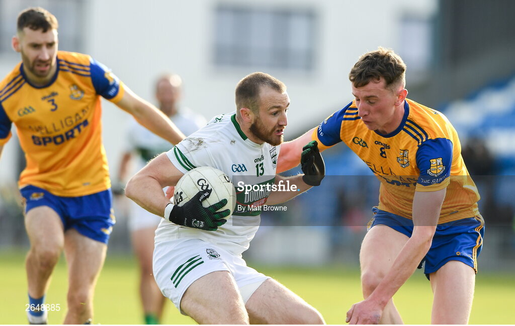 15 October 2023; Benny Carroll of Portlaoise in action against Michael Dempsey of St Joseph's during the Laois County Senior Club Football Championship final match between St Joseph's and Portlaoise at Laois Hire O'Moore Park in Portlaoise, Laois. Photo by Matt Browne/Sportsfile
