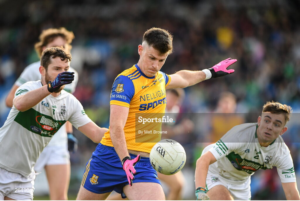 15 October 2023; Brian Daly of St Joseph's in action against Aidan McGovern and Ben Dempsey of Portlaoise during the Laois County Senior Club Football Championship final match between St Joseph's and Portlaoise at Laois Hire O'Moore Park in Portlaoise, Laois. Photo by Matt Browne/Sportsfile