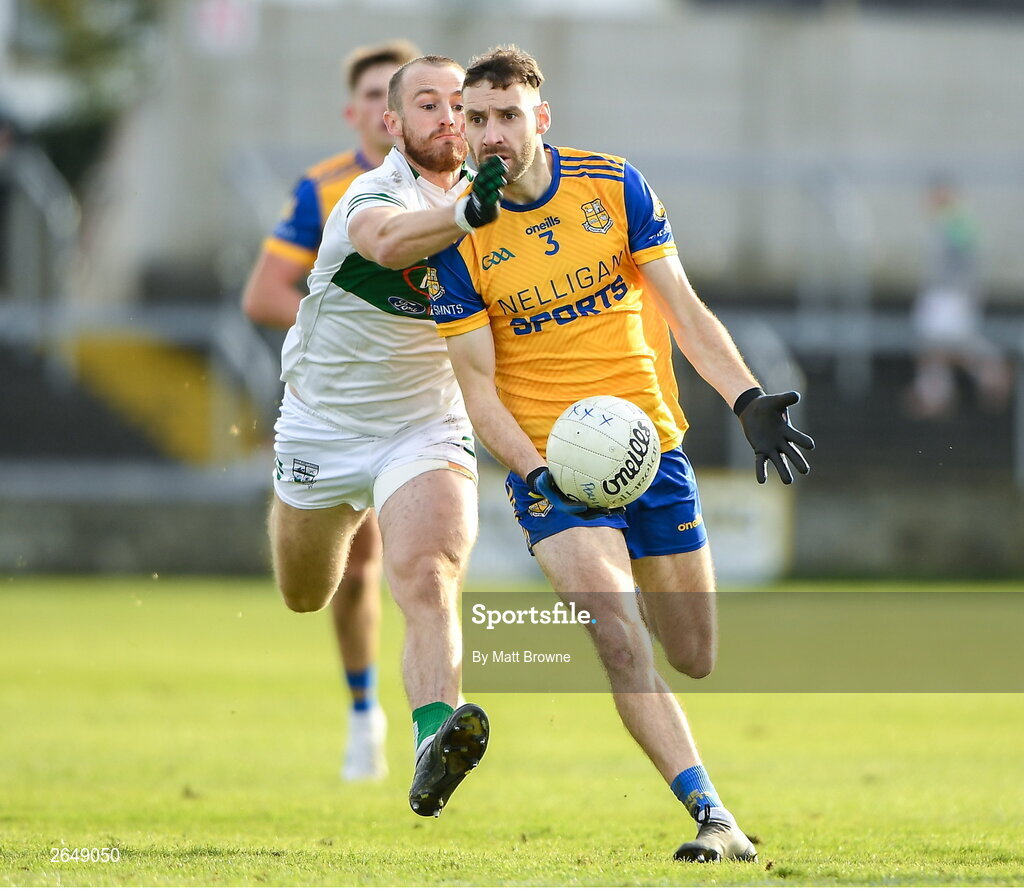 15 October 2023; Adam Campion of St Joseph's in action against Benny Carroll of Portlaoise during the Laois County Senior Club Football Championship final match between St Joseph's and Portlaoise at Laois Hire O'Moore Park in Portlaoise, Laois. Photo by Matt Browne/Sportsfile