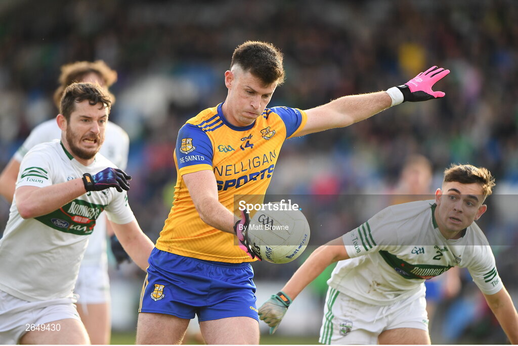 15 October 2023; Brian Daly of St Joseph's in action against Aidan McGovern and Ben Dempsey of Portlaoise during the Laois County Senior Club Football Championship final match between St Joseph's and Portlaoise at Laois Hire O'Moore Park in Portlaoise, Laois. Photo by Matt Browne/Sportsfile