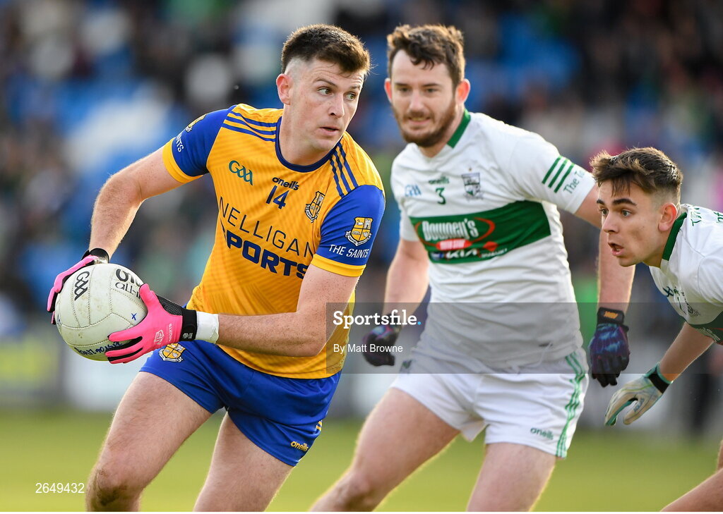 15 October 2023; Brian Daly of St Joseph's in action against Aidan McGovern and Ben Dempsey of Portlaoise during the Laois County Senior Club Football Championship final match between St Joseph's and Portlaoise at Laois Hire O'Moore Park in Portlaoise, Laois. Photo by Matt Browne/Sportsfile