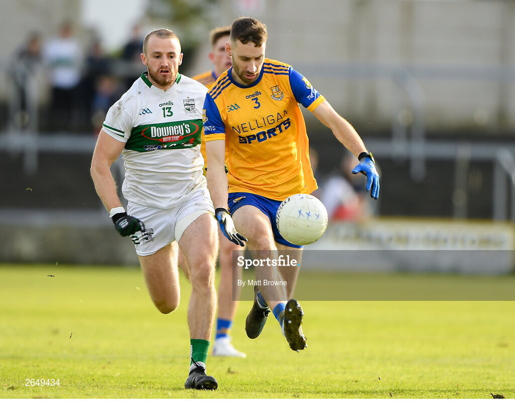15 October 2023; Adam Campion of St Joseph's in action against Benny Carroll of Portlaoise during the Laois County Senior Club Football Championship final match between St Joseph's and Portlaoise at Laois Hire O'Moore Park in Portlaoise, Laois. Photo by Matt Browne/Sportsfile