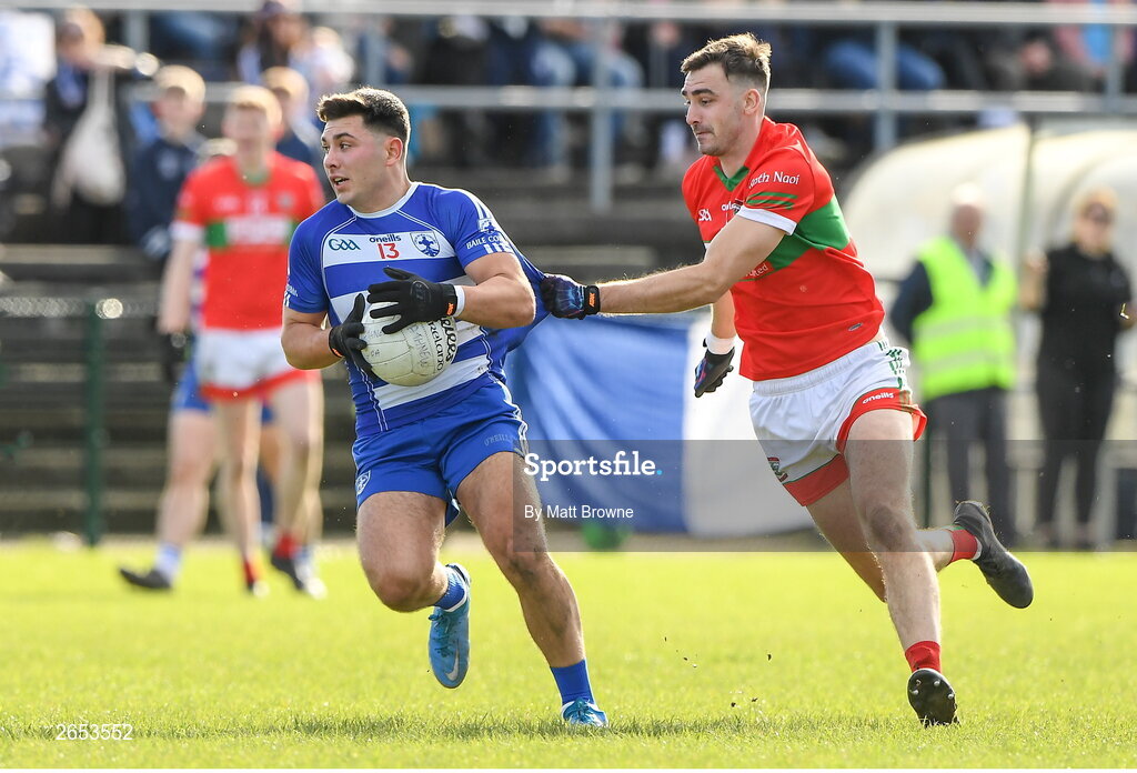 22 October 2023; Dan Silke Fetherson of Blessington in action against Jamie Smell of Rathnew during the Wicklow County Senior Club Football Championship final between Blessington and Rathnew at Echelon Park in Aughrim, Wicklow. Photo by Matt Browne/Sportsfile
