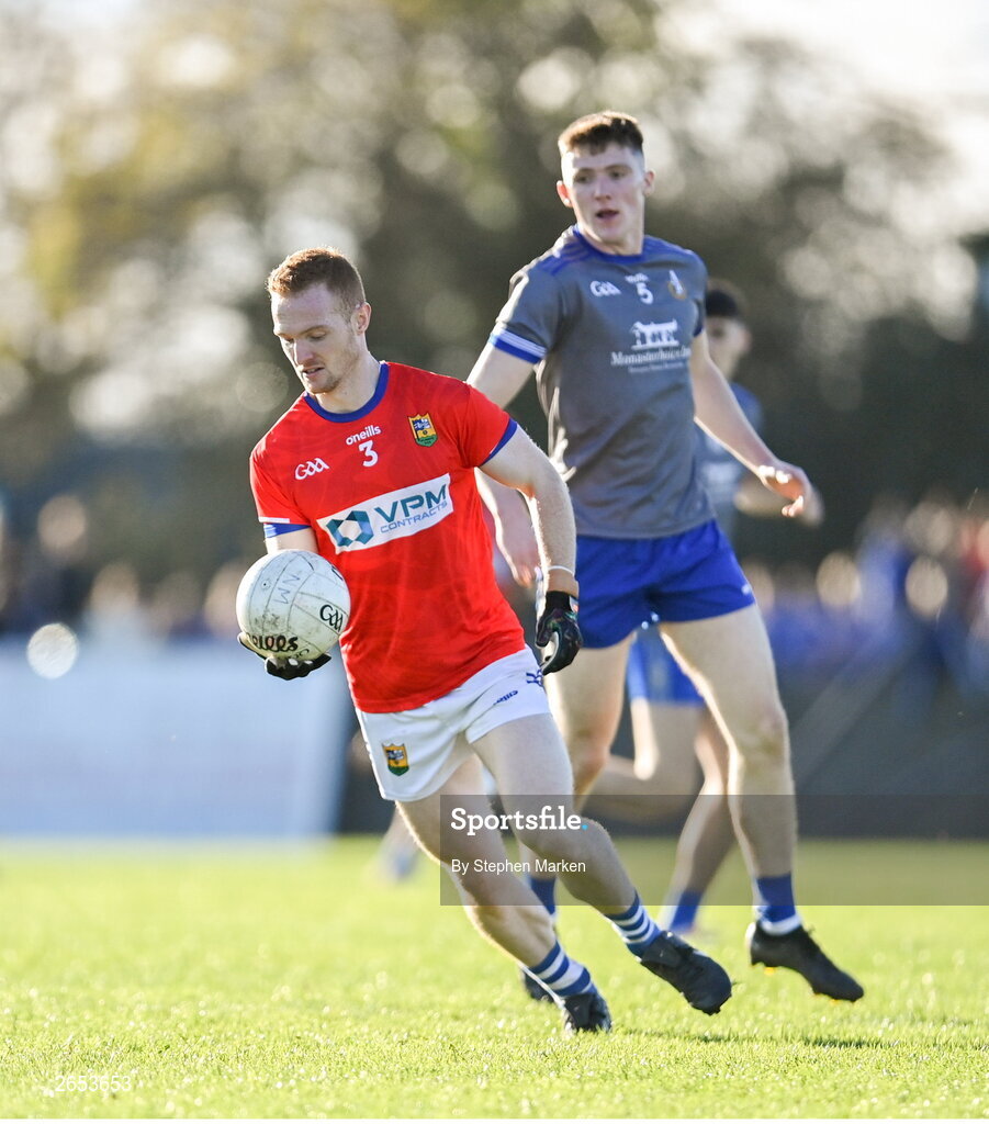 22 October 2023; Donal McKenny of Ardee St Mary's in action against Evan Whelan of Naomh Mairtin during the Louth County Senior Club Football Championship final between Ardee St Mary's and Naomh Mairtin at Pairc Naomh Bríd in Dowdallshill, Louth. Photo by Stephen Marken/Sportsfile