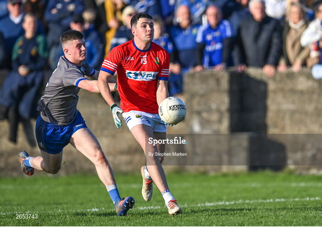 22 October 2023; Jay Crawley of Ardee St Mary's in action against Tadhg O'Brien of Naomh Mairtin during the Louth County Senior Club Football Championship final between Ardee St Mary's and Naomh Mairtin at Pairc Naomh Bríd in Dowdallshill, Louth. Photo by Stephen Marken/Sportsfile