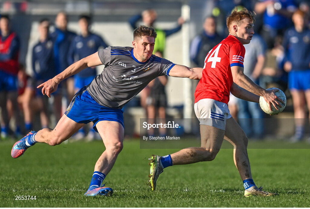 22 October 2023; Dáire McConnon of Ardee St Mary's in action against Thomas O'Sullivan of Naomh Mairtin during the Louth County Senior Club Football Championship final between Ardee St Mary's and Naomh Mairtin at Pairc Naomh Bríd in Dowdallshill, Louth. Photo by Stephen Marken/Sportsfile