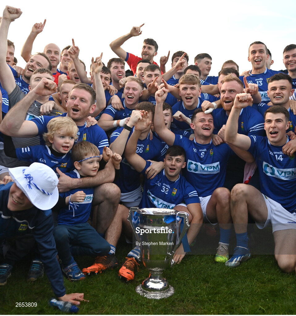 22 October 2023; Ardee St. Mary's players and supporters with the Joe Ward Cup after the Louth County Senior Club Football Championship final between Ardee St Mary's and Naomh Mairtin at Pairc Naomh Bríd in Dowdallshill, Louth. Photo by Stephen Marken/Sportsfile