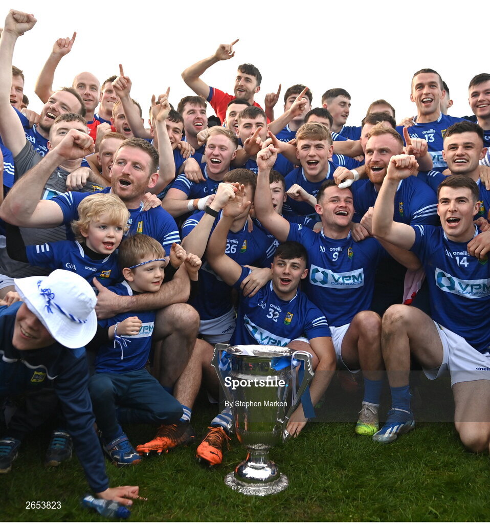 22 October 2023; Ardee St. Mary's players and supporters with the Joe Ward Cup after the Louth County Senior Club Football Championship final between Ardee St Mary's and Naomh Mairtin at Pairc Naomh Bríd in Dowdallshill, Louth. Photo by Stephen Marken/Sportsfile