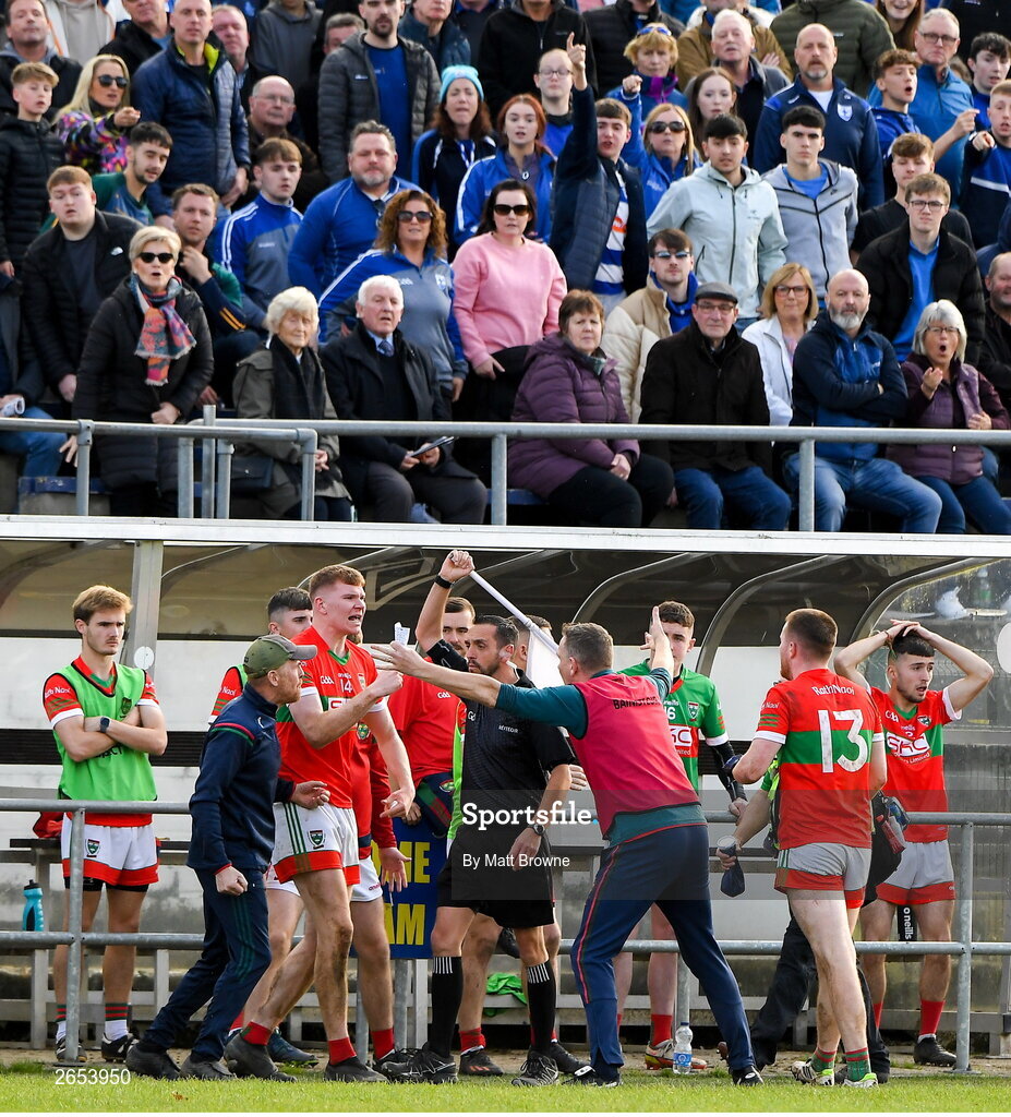 22 October 2023; Linesman Stephen Fagan with Rathnew manager Darren Coffey and backroom staff during the Wicklow County Senior Club Football Championship final between Blessington and Rathnew at Echelon Park in Aughrim, Wicklow. Photo by Matt Browne/Sportsfile