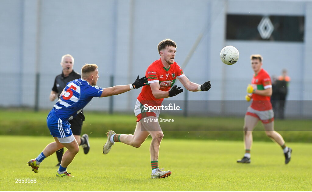 22 October 2023; Sam O'Dowd of Rathnew in action against Kevin Hanlon of Blessington during the Wicklow County Senior Club Football Championship final between Blessington and Rathnew at Echelon Park in Aughrim, Wicklow. Photo by Matt Browne/Sportsfile