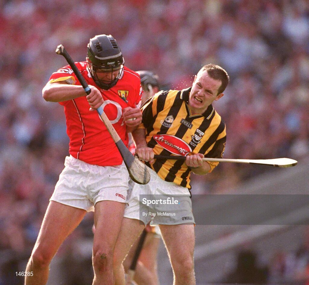 14 September 2003; Setanta O'hAilpin, Cork, in action against Kilkenny's Michael Kavanagh. Guinness All-Ireland Senior Hurling Championship Final, Kilkenny v Cork, Croke Park, Dublin. Picture credit; Ray McManus / SPORTSFILE