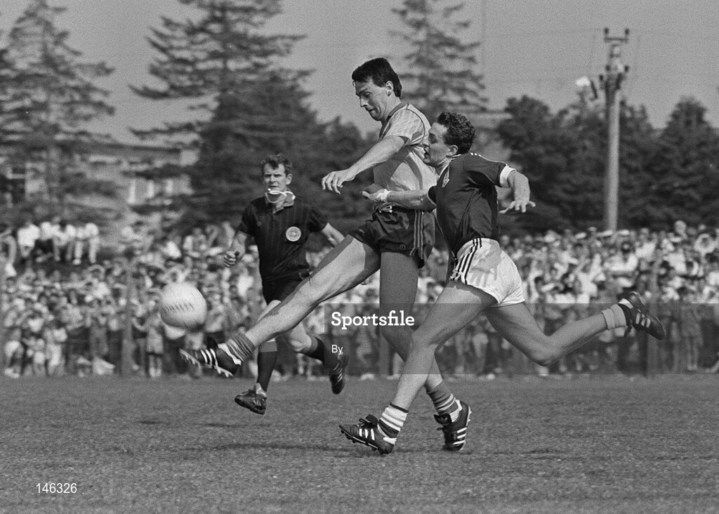 22 July 1990; John Newton, left, Roscommon, is tackled by John Fallon, Galway. Galway v Roscommon, Connacht Football Championship Finals, Dr Hide Park, Co. Roscommon. Picture credit; Ray McManus / SPORTSFILE