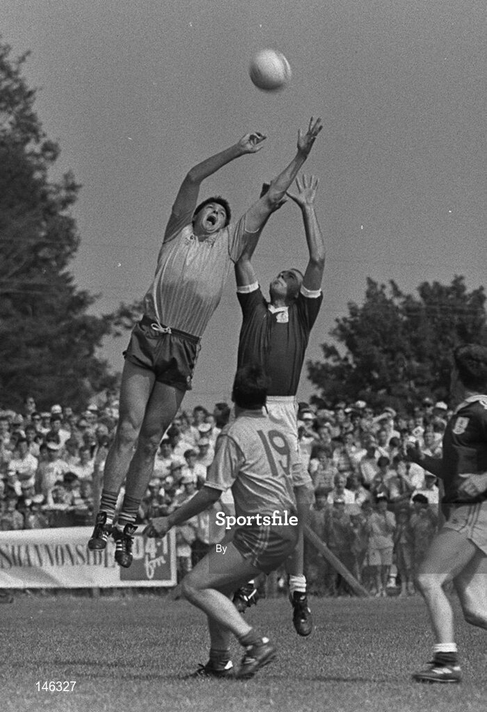 22 July 1990; John Newton, Roscommon, is action against Brian Moylan, Galway, whilst team-mate Padraig McNeil, Roscommon, awaits the breaking ball. Galway v Roscommon, Connacht Football Championship Finals, Dr Hide Park, Co. Roscommon. Picture credit; Ray McManus / SPORTSFILE