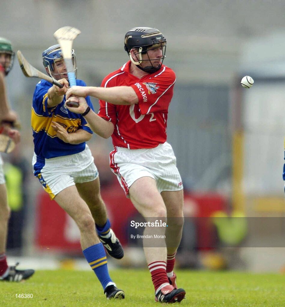10 July 2004; Wayne Sherlock, Cork, in action against Benny Dunne, Tipperary. Guinness Senior Hurling Championship Qualifier, Round 3, Cork v Tipperary, Fitzgerald Stadium, Killarney, Co. Kerry. Picture credit; Brendan Moran / SPORTSFILE