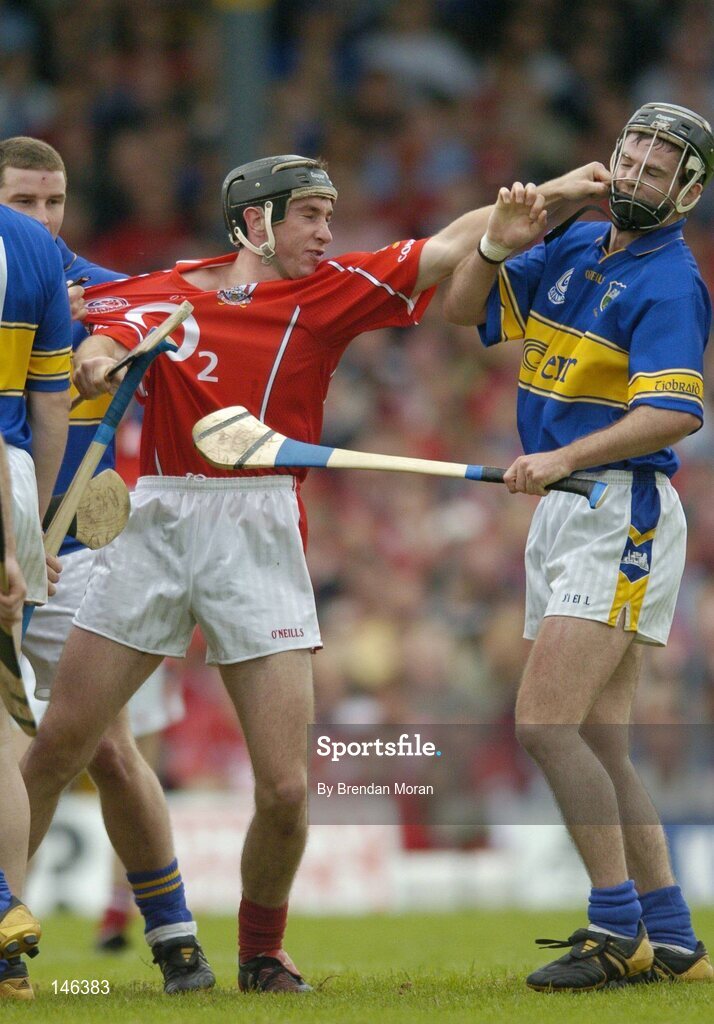 10 July 2004; Cork's John Gardiner in an altercation with Tipperary's Colin Morrissey. Guinness Senior Hurling Championship Qualifier, Round 3, Cork v Tipperary, Fitzgerald Stadium, Killarney, Co. Kerry. Picture credit; Brendan Moran / SPORTSFILE