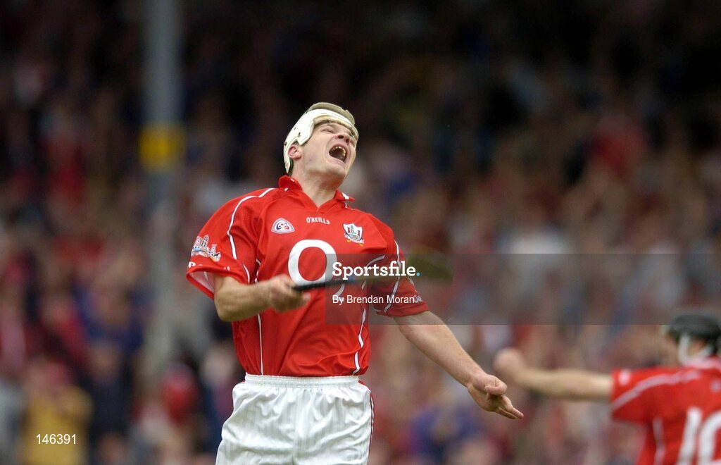 10 July 2004; Niall McCarthy, Cork, celebrates scoring his sides second goal against Tipperary by throwing his hurley in the air. Guinness Senior Hurling Championship Qualifier, Round 3, Cork v Tipperary, Fitzgerald Stadium, Killarney, Co. Kerry. Picture credit; Brendan Moran / SPORTSFILE