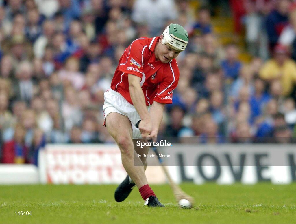 10 July 2004; Niall McCarthy, Cork, pulls on the sliotar to score his sides second goal against Tipperary. Guinness Senior Hurling Championship Qualifier, Round 3, Cork v Tipperary, Fitzgerald Stadium, Killarney, Co. Kerry. Picture credit; Brendan Moran / SPORTSFILE