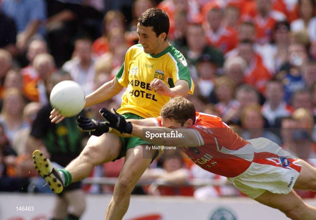 11 July 2004; Rory Kavanagh, Donegal, is tackled by Kieran McGeeney, Armagh. Bank of Ireland Ulster Senior Football Championship Final, Armagh v Donegal, Croke Park, Dublin. Picture credit; Matt Browne / SPORTSFILE
