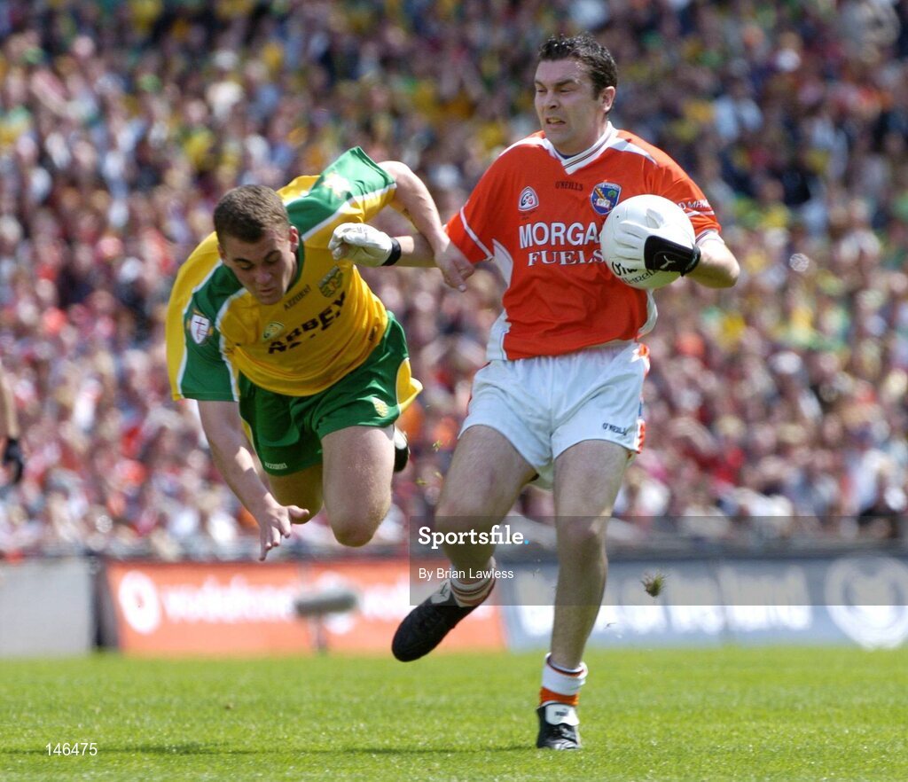 11 July 2004; Oisin McConville, Armagh, in action against Eamon McGee, Donegal. Bank of Ireland Ulster Senior Football Championship Final, Armagh v Donegal, Croke Park, Dublin. Picture credit; Brian Lawless / SPORTSFILE