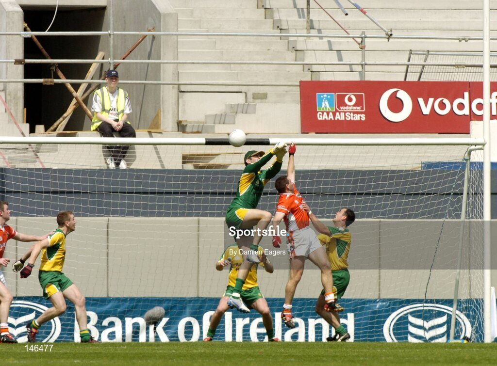 11 July 2004; Diarmuid Marsden, Armagh, gets to the ball before Donegal goalkeeper Paul Durcan to score his sides opening goal. Bank of Ireland Ulster Senior Football Championship Final, Armagh v Donegal, Croke Park, Dublin. Picture credit; Damien Eagers / SPORTSFILE