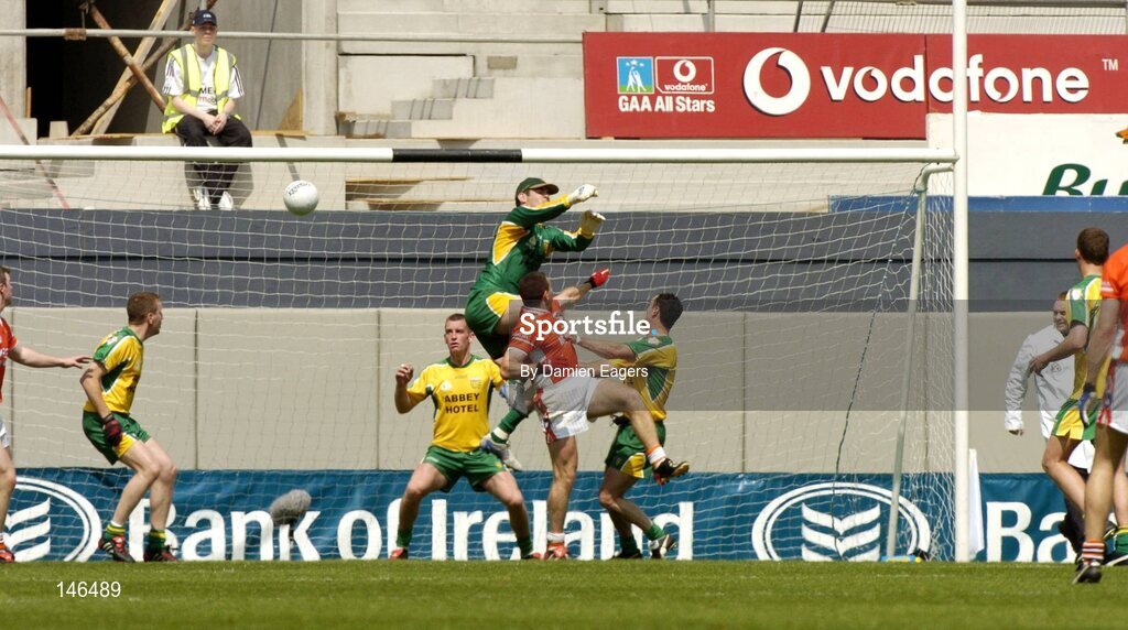 11 July 2004; Armagh's Diarmuid Marsden gets to the ball ahead of Donegal goalkeeper Paul Durcan to score their opening goal. Bank of Ireland Ulster Senior Football Championship Final, Armagh v Donegal, Croke Park, Dublin. Picture credit; Damien Eagers / SPORTSFILE